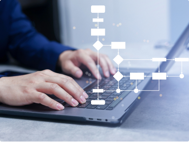 Image of hands on a laptop key board with an overlay of a flowchart