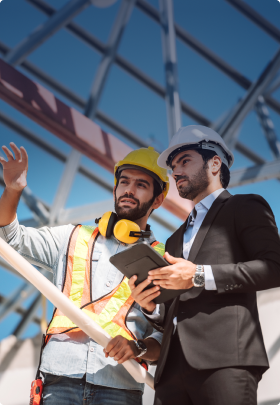 Image of two workers on a construction site