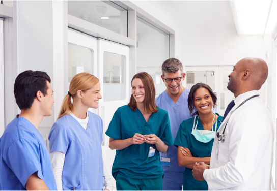 Photo of medical professionals smiling and interacting