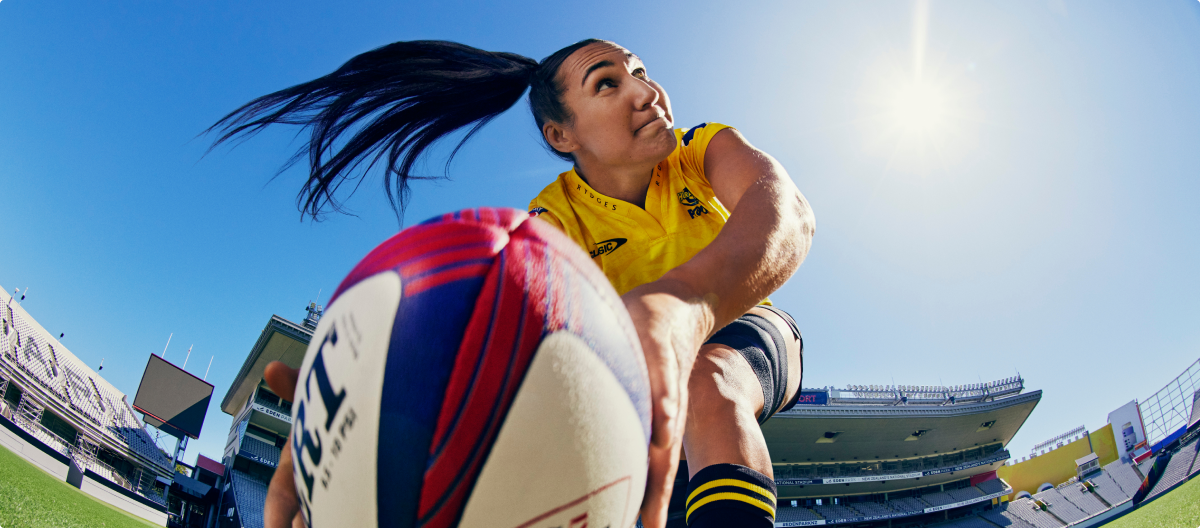 Image of a woman playing rugby