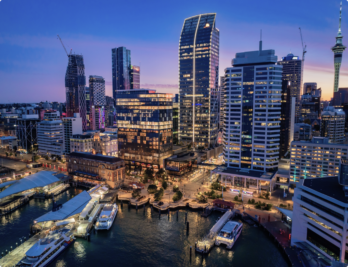 Aerial view of downtown Auckland waterfront at dusk