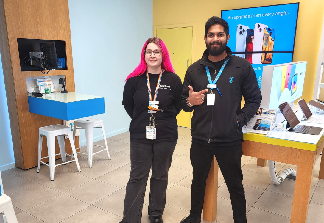 Two 2degrees staff members in a 2degrees retail store