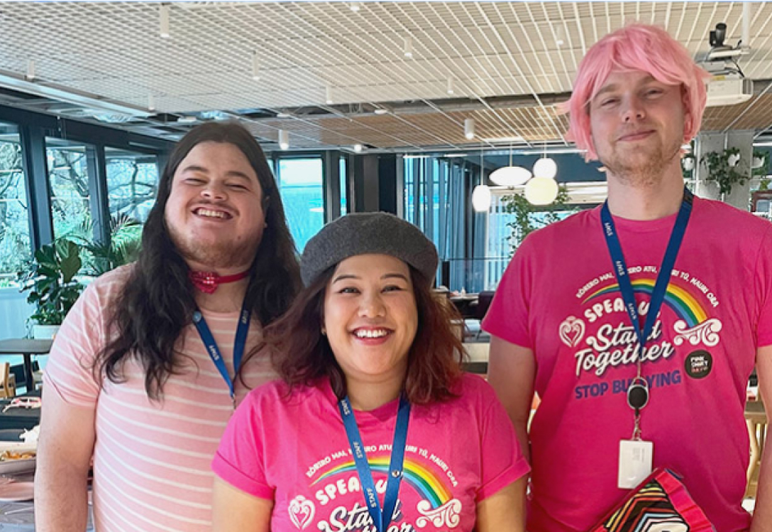 2degrees staff members wearing their pink shirts on Pink Shirt Day