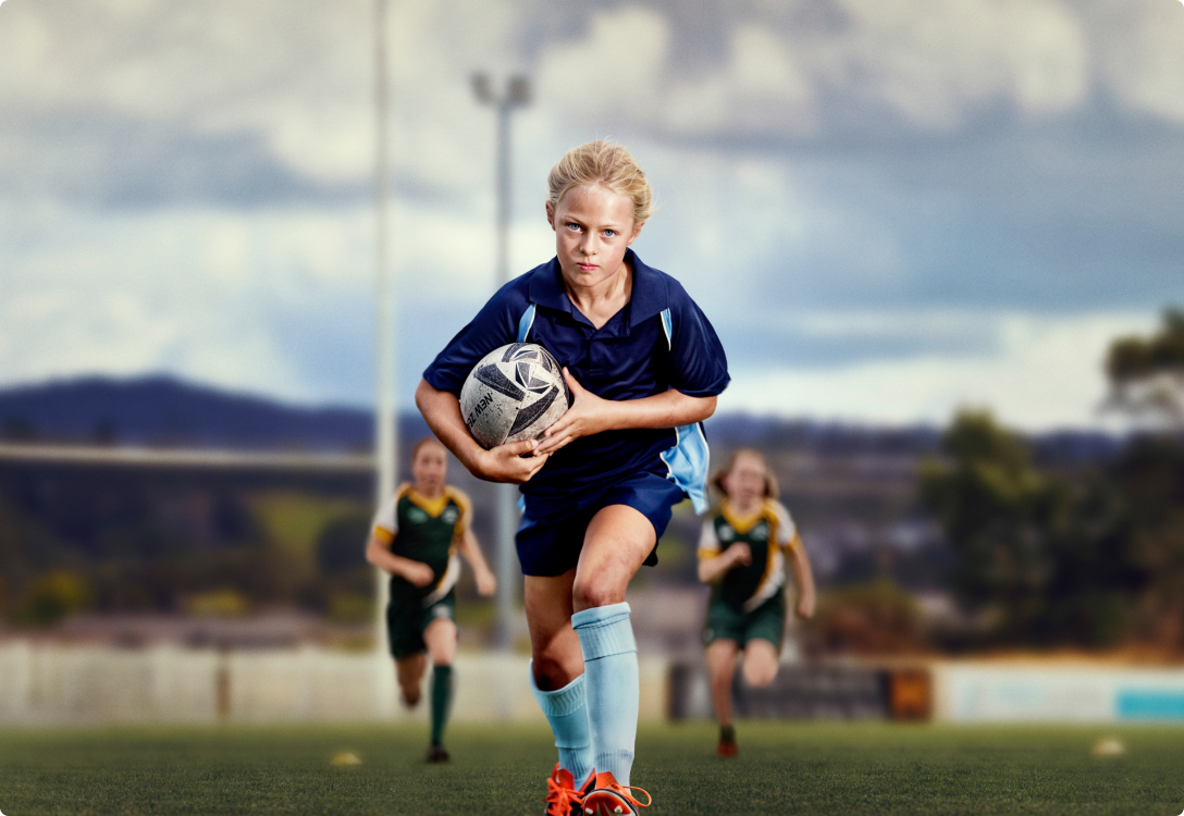 Image of a girl playing rugby